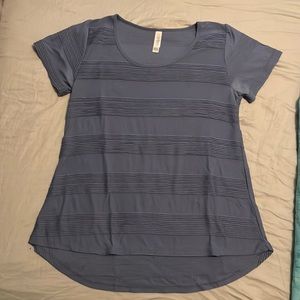 Lularoe blue top.